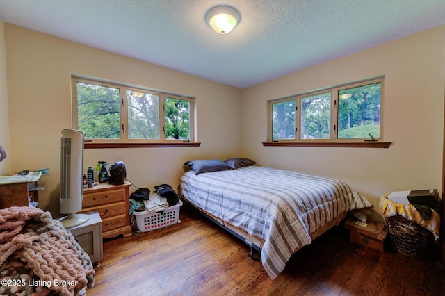 7105 Woodrow Way, Louisville, KY 40228 - bedroom with multiple windows and wood finished floors
