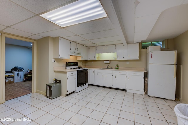 7105 Woodrow Way, Louisville, KY 40228 - kitchen featuring white appliances, under cabinet range hood, light countertops, white cabinetry, and a drop ceiling