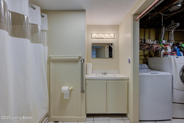 7105 Woodrow Way, Louisville, KY 40228 - full bathroom with washer and clothes dryer, vanity, tile patterned floors, and a shower with curtain