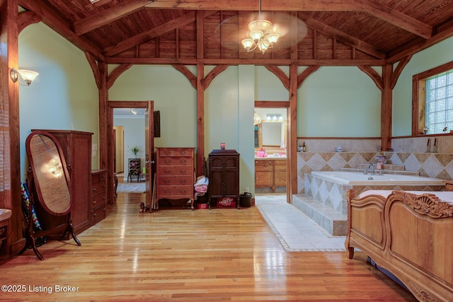 7105 Woodrow Way, Louisville, KY 40228 - full bath featuring wooden ceiling, wood finished floors, a garden tub, vanity, and a chandelier