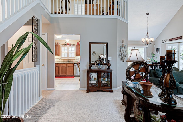 12305 Dominion Way, Louisville, KY 40299 - corridor featuring an inviting chandelier, light carpet, a sink, baseboards, and high vaulted ceiling