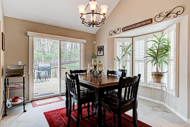 12305 Dominion Way, Louisville, KY 40299 - carpeted dining room with lofted ceiling, baseboards, and a chandelier