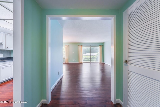 5100 US Highway 42 Unit 226, Louisville, KY 40241 - corridor with dark wood-type flooring and baseboards