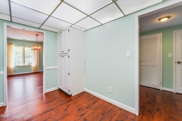 5100 US Highway 42 Unit 226, Louisville, KY 40241 - spare room featuring a chandelier, dark wood finished floors, and baseboards