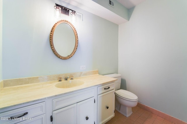 5100 US Highway 42 Unit 226, Louisville, KY 40241 - half bathroom with toilet, vanity, tile patterned flooring, and baseboards
