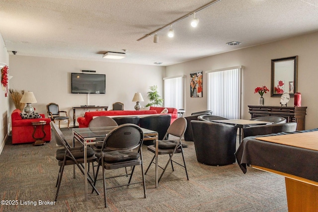 5100 US Highway 42 Unit 226, Louisville, KY 40241 - carpeted dining room with a textured ceiling and rail lighting