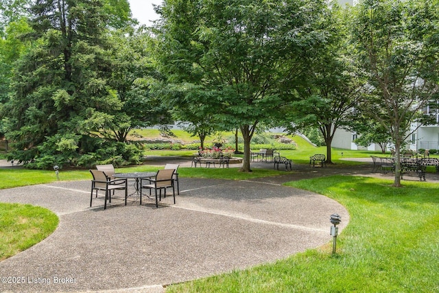 5100 US Highway 42 Unit 226, Louisville, KY 40241 - view of property's community featuring a lawn and a patio area