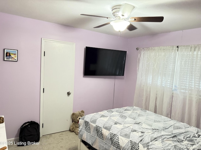 bedroom with carpet flooring and a ceiling fan