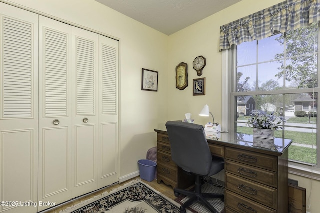 office space featuring baseboards
