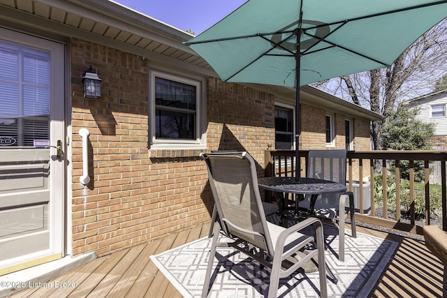 wooden deck featuring central AC