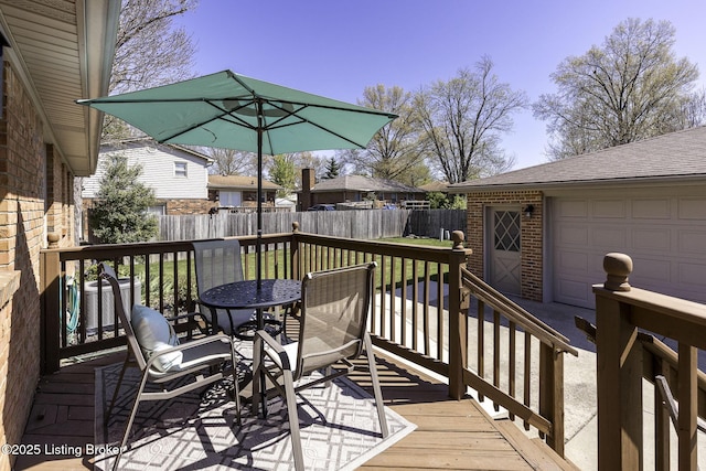 wooden deck with fence, outdoor dining area, and central air condition unit