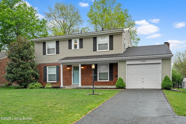 view of front of property with an attached garage, brick siding, driveway, and a front lawn