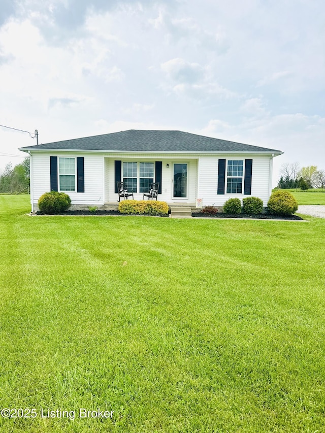 single story home with a front lawn