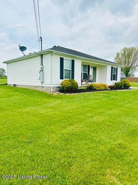 exterior space with crawl space and a front yard