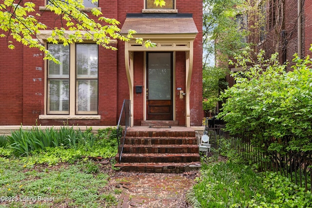 1206 S 6th St, Louisville, KY 40203 - property entrance with fence and brick siding