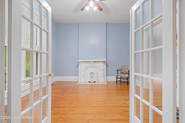 1206 S 6th St, Louisville, KY 40203 - interior space featuring baseboards, french doors, and wood finished floors