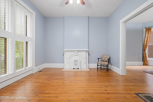 1206 S 6th St, Louisville, KY 40203 - unfurnished room featuring baseboards, a ceiling fan, wood finished floors, and visible vents