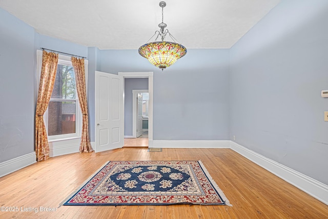 1206 S 6th St, Louisville, KY 40203 - interior space featuring hardwood / wood-style flooring and baseboards