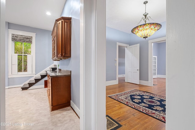 1206 S 6th St, Louisville, KY 40203 - corridor featuring stairway, light wood finished floors, baseboards, visible vents, and recessed lighting