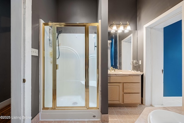1206 S 6th St, Louisville, KY 40203 - bathroom featuring a shower stall, tile patterned floors, and vanity