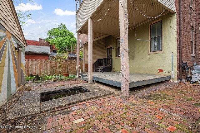1206 S 6th St, Louisville, KY 40203 - view of patio featuring fence