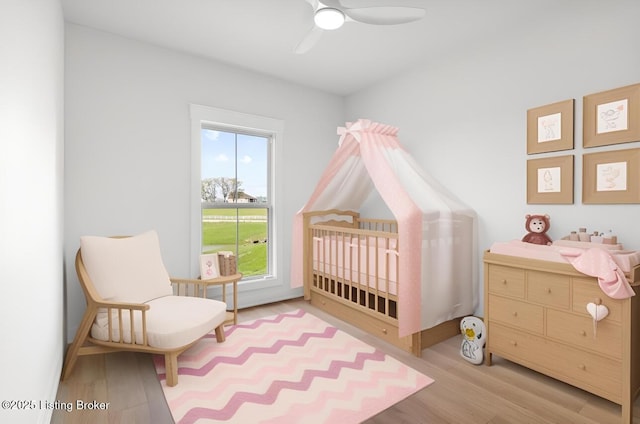 221 Natalies Way, Bardstown, KY 40004 - bedroom featuring wood finished floors and a nursery area