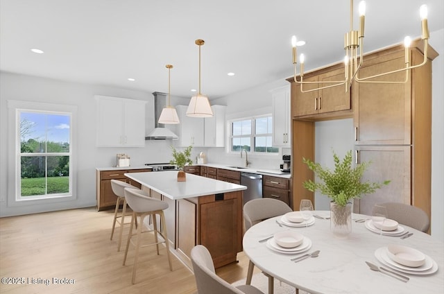 221 Natalies Way, Bardstown, KY 40004 - kitchen featuring custom range hood, a center island, light wood-style floors, dishwasher, and light countertops