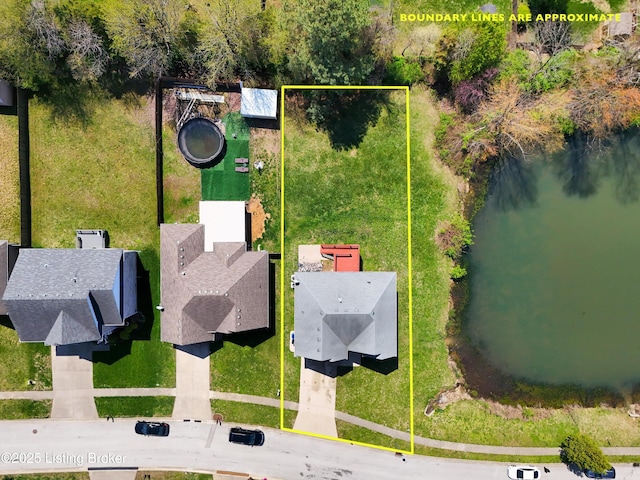bird's eye view with a water view and a residential view