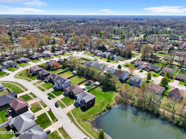 aerial view featuring a water view and a residential view
