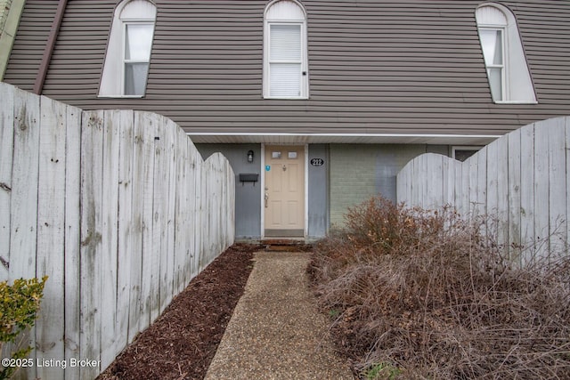 212 La Fontenay Ct, Louisville, KY 40223 - doorway to property with brick siding and fence