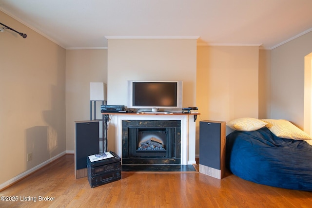 212 La Fontenay Ct, Louisville, KY 40223 - living area featuring baseboards, a fireplace with flush hearth, crown molding, and wood finished floors