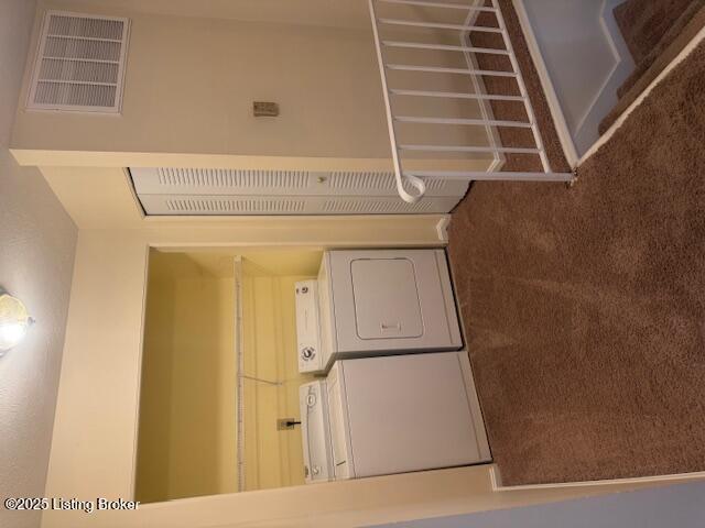 212 La Fontenay Ct, Louisville, KY 40223 - washroom featuring visible vents and stacked washer and clothes dryer