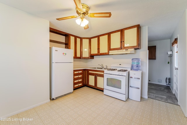 215 Bottorff Dr, Sellersburg, IN 47172 - kitchen featuring under cabinet range hood, light countertops, a ceiling fan, a sink, and white appliances