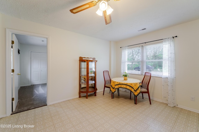 215 Bottorff Dr, Sellersburg, IN 47172 - dining space with baseboards, a ceiling fan, visible vents, and tile patterned floors