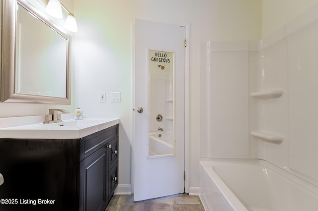 215 Bottorff Dr, Sellersburg, IN 47172 - bathroom featuring baseboards, vanity, and tub / shower combination