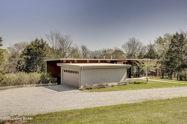 garage featuring driveway