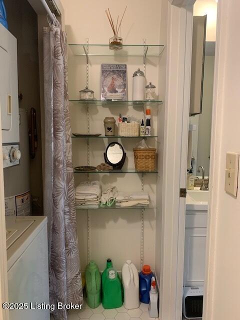325 Rosewood Dr, Louisville, KY 40223 - storage area with estacked washer and dryer
