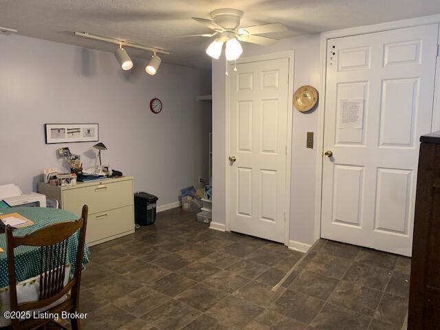 325 Rosewood Dr, Louisville, KY 40223 - dining area with a ceiling fan, baseboards, and track lighting