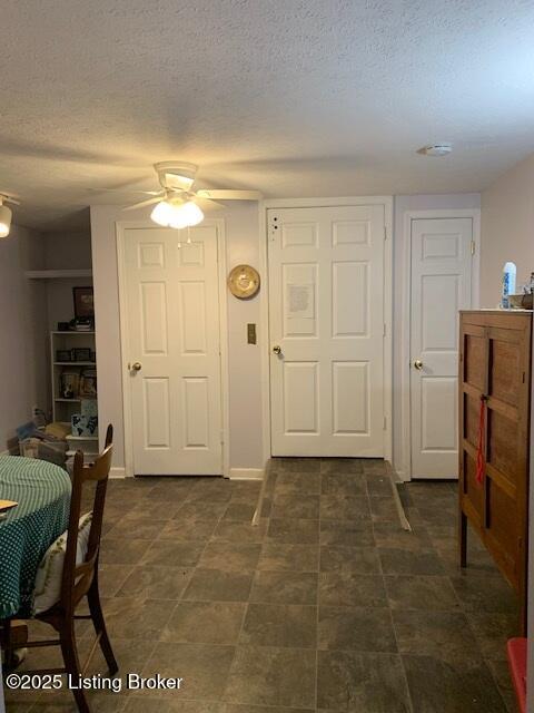 325 Rosewood Dr, Louisville, KY 40223 - entryway with ceiling fan, a textured ceiling, and baseboards