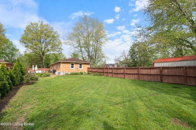view of yard with fence