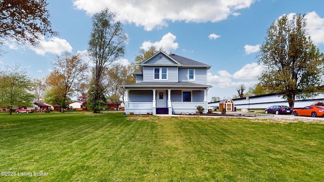 702 11th St, Carrollton, KY 41008 - view of front of home with roof with shingles, a porch, and a front yard