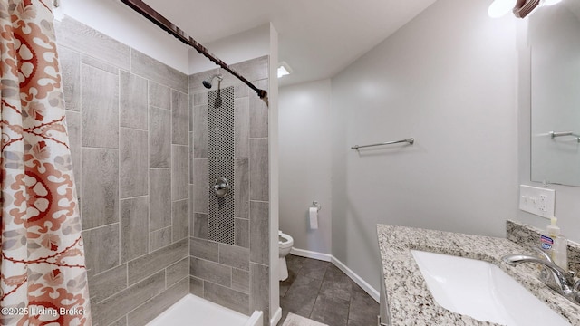 702 11th St, Carrollton, KY 41008 - bathroom with tile patterned floors, toilet, baseboards, a shower stall, and vanity