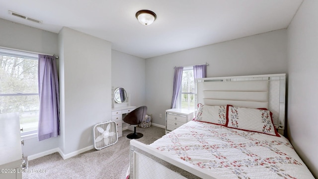 702 11th St, Carrollton, KY 41008 - carpeted bedroom featuring baseboards and visible vents