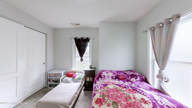 702 11th St, Carrollton, KY 41008 - carpeted bedroom featuring visible vents