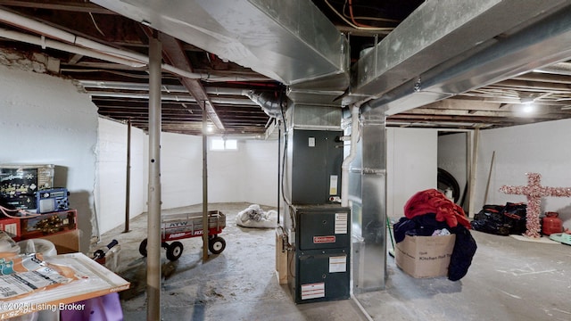702 11th St, Carrollton, KY 41008 - basement with heating unit