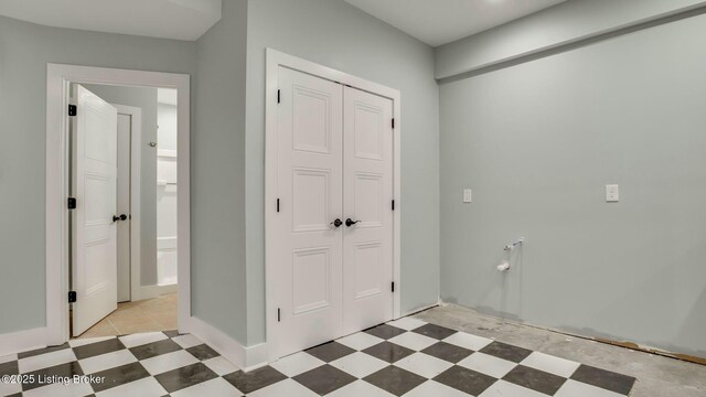 washroom featuring light floors