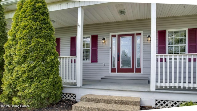doorway to property featuring a porch
