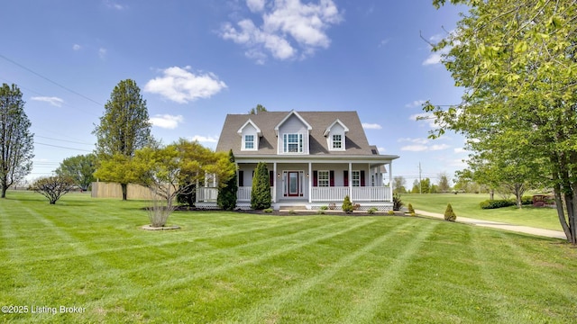 cape cod house featuring a front yard and covered porch