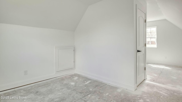 bonus room with vaulted ceiling