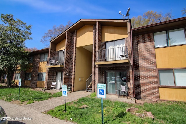 view of building exterior featuring stairs